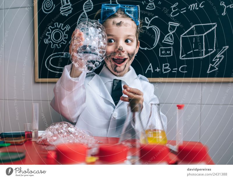 Happy hid holding glass with soap foam Face Playing Flat (apartment) Table Science & Research Child School Classroom Blackboard Laboratory Human being
