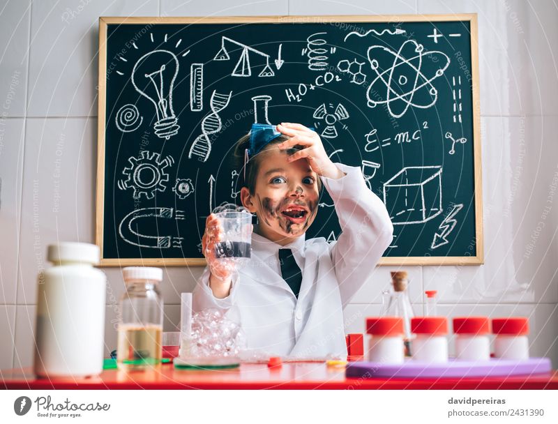 Surprised little scientist with dirty face holding glass with soap foam Happy Face Playing Flat (apartment) Table Science & Research Child School Classroom