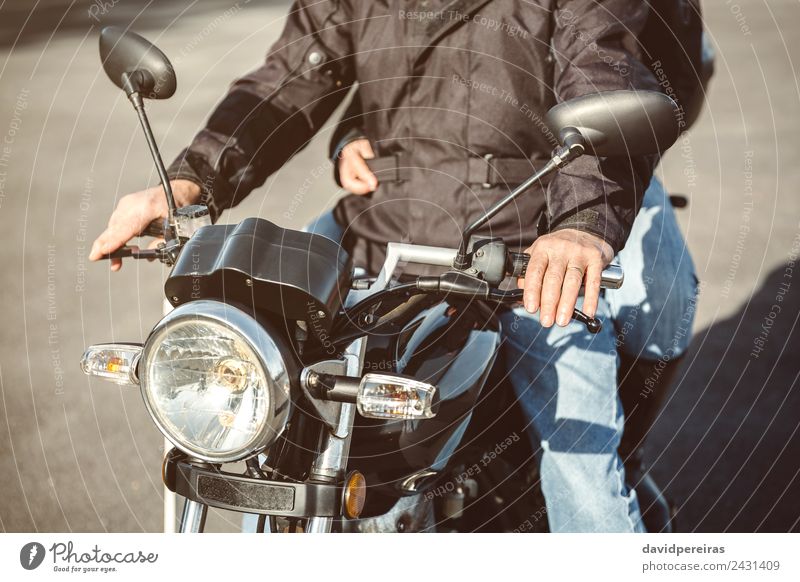Senior man steering motorcycle on road Lifestyle Vacation & Travel Trip Adventure Mirror Human being Man Adults Couple Hand Transport Street Vehicle Motorcycle