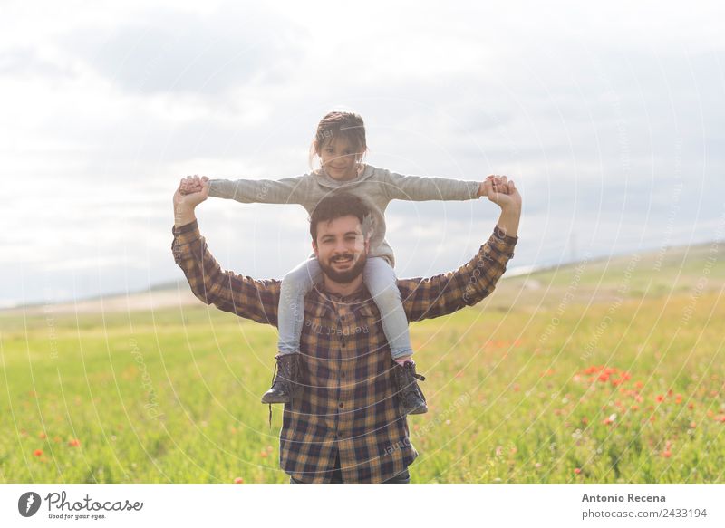 Father and daughter Playing Child Man Adults Parents Family & Relations Infancy 2 Human being 3 - 8 years 18 - 30 years Youth (Young adults) Flower Meadow