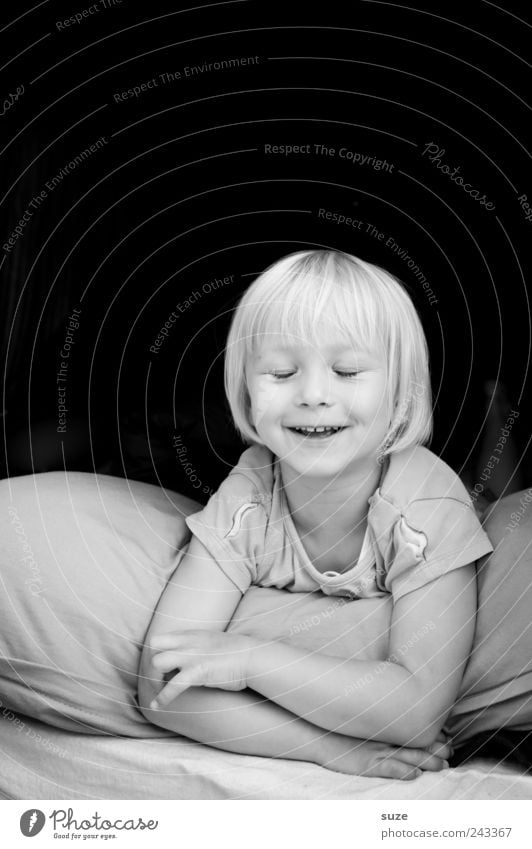 smile Joy Face Child Human being Toddler Girl 1 3 - 8 years Infancy Blonde Smiling Laughter Lie Cushion Small Cute Black & white photo Exterior shot