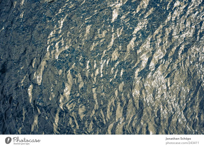 crumpled surface, cold underneath Water Waves Lake River Blue Wet Cold Damp Reflection Surface Surface structure Exterior shot Bird's-eye view Flat Simple