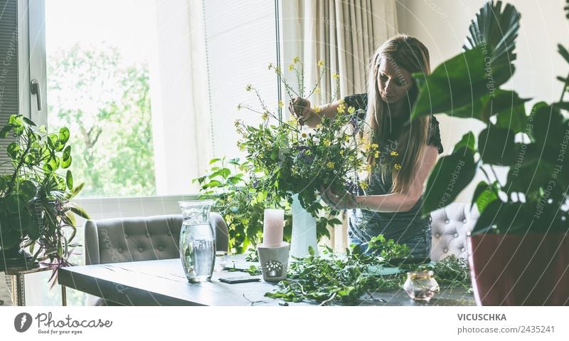 Woman makes wildflower bouquet in vase on the table Lifestyle Style Design Leisure and hobbies Summer Living or residing Flat (apartment)