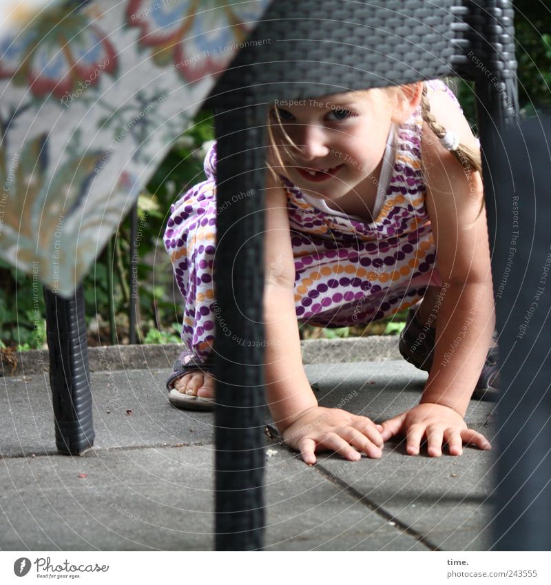 undercover Joy Playing Table Human being Girl Eyes Hand 1 1 - 3 years Toddler Blonde Observe Crouch table leg Rest on Colour photo Subdued colour Exterior shot