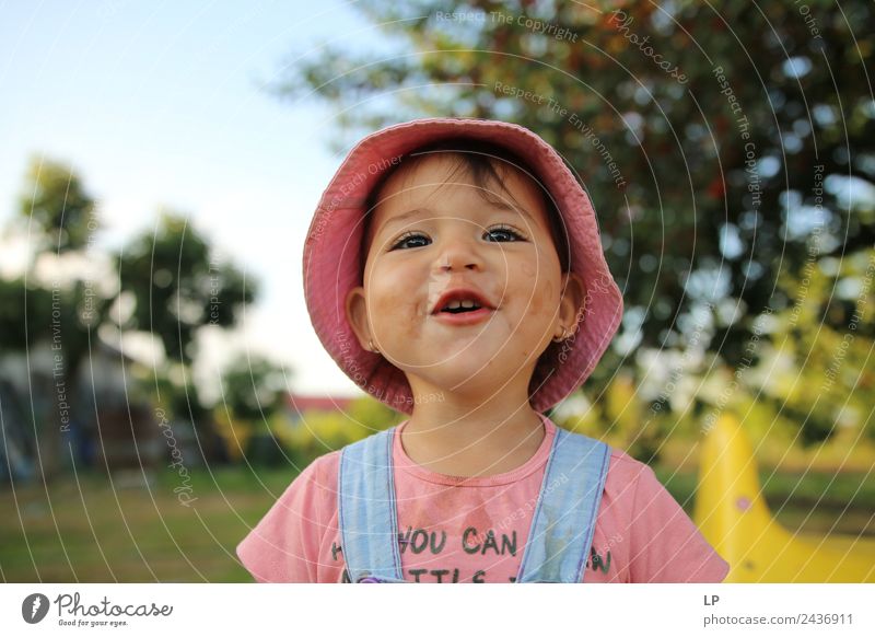 small girl wearing a hat singing happily Parenting Education Kindergarten Child Apprentice Academic studies Human being Parents Adults Brothers and sisters