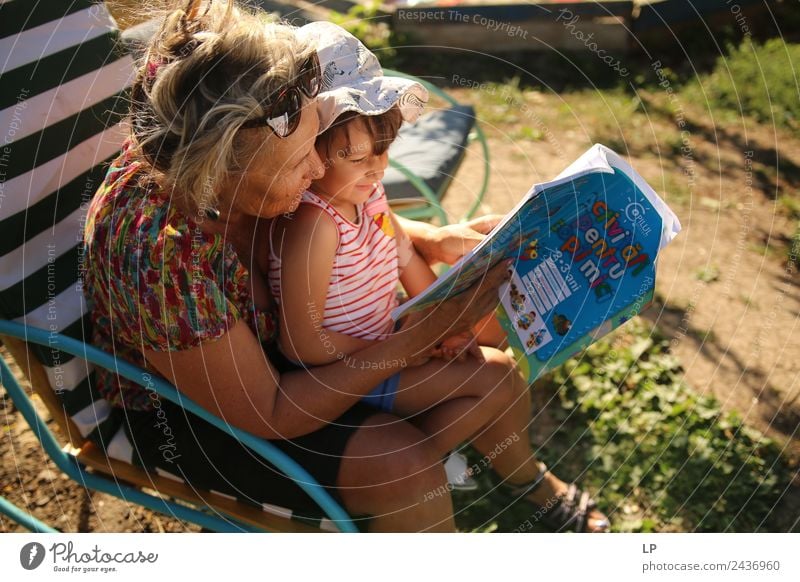 grandma reading a book to a child Lifestyle Leisure and hobbies Playing Children's game Parenting Education Adult Education Kindergarten School Student Teacher