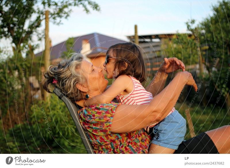 Kiss Lifestyle Joy Parenting Education Human being Feminine Child Woman Adults Female senior Parents Brothers and sisters Grandparents Senior citizen