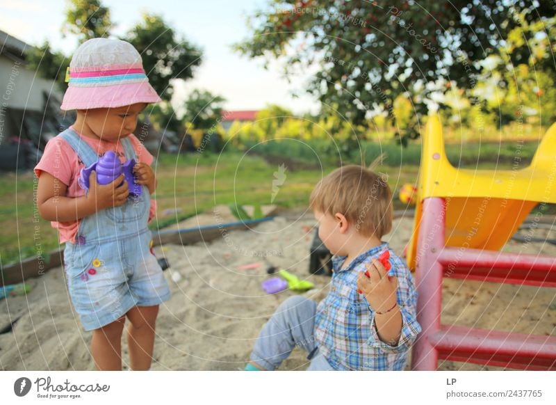 children playing in the sand, having a conversation over sand toys Playing Children's game Living or residing Parenting Education Kindergarten Office work