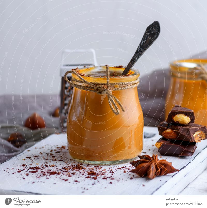 Caramel dessert Toffee Dessert Candy Spoon Table Wood Eating Delicious Brown Sauce background jar toffee pouring sweet Sugar Home-made food Sticky Syrup glass