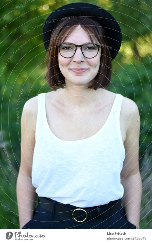 grin, female, young, pretty Feminine Young woman Youth (Young adults) 1 Human being 18 - 30 years Adults Piercing Eyeglasses Hat Brunette Short-haired Smiling