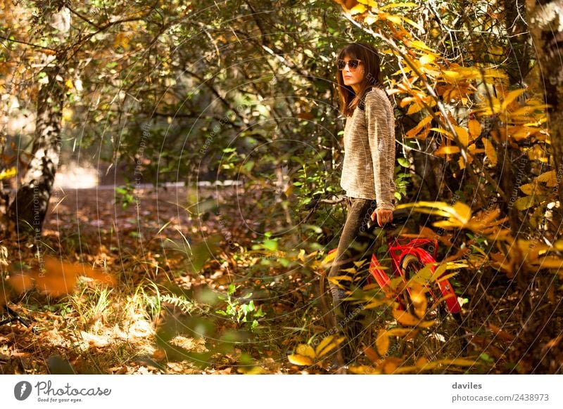 Woman with a bike in the middle of the forest. Lifestyle Happy Vacation & Travel Trip Garden Human being Young woman Youth (Young adults) 1 18 - 30 years Adults