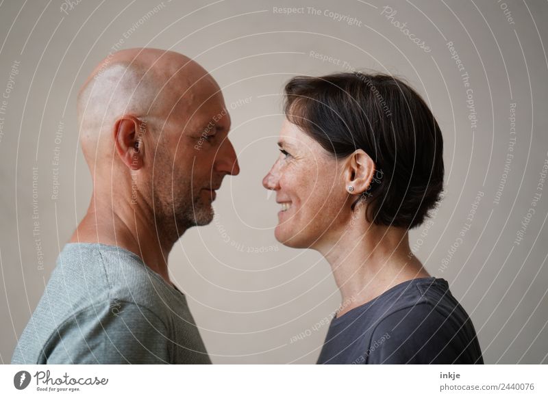 Man and woman face each other Woman Adults Friendship Couple Partner Life Face 2 Human being 30 - 45 years 45 - 60 years Smiling Laughter Looking Authentic