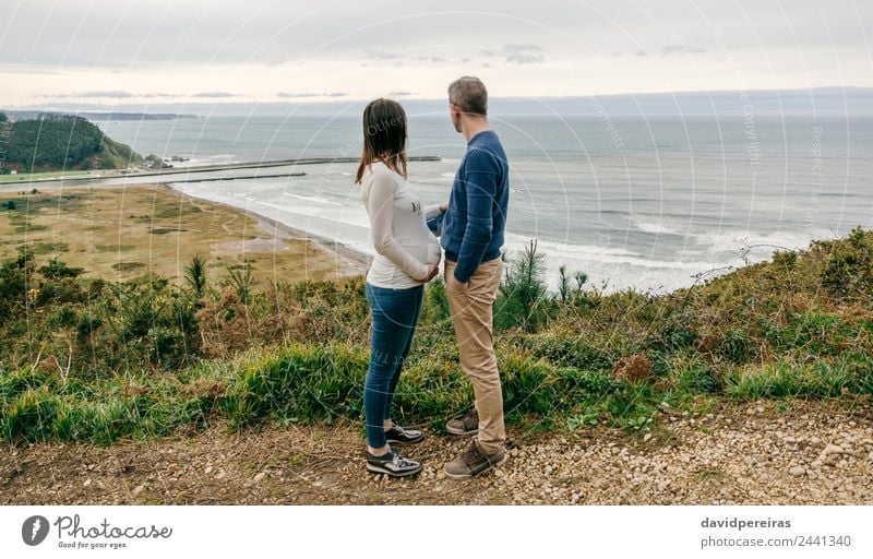 Couple watching the sea Lifestyle Calm Leisure and hobbies Beach Ocean Waves Woman Adults Man Parents Family & Relations Nature Landscape Horizon Autumn Coast