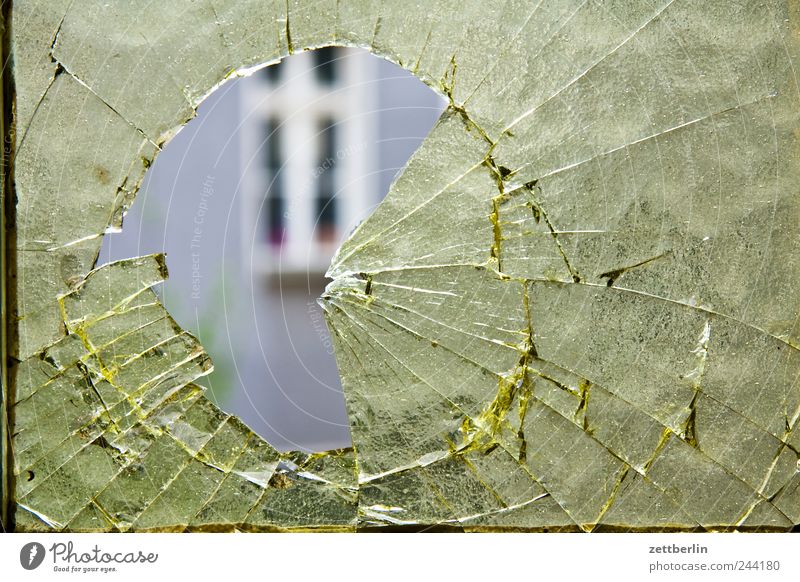 hole Downtown House (Residential Structure) Manmade structures Building Architecture Wall (barrier) Wall (building) Facade Window Glass Throw Broken Anger