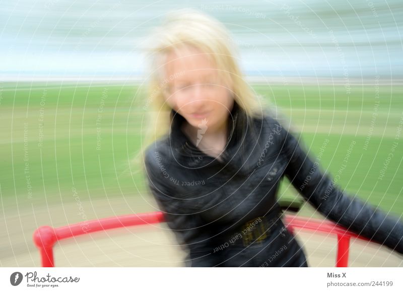 Rotating worm II Playing Children's game Feminine Young woman Youth (Young adults) 1 Human being Blonde Rotate To hold on Flying Joy Carousel Vertigo Giddy