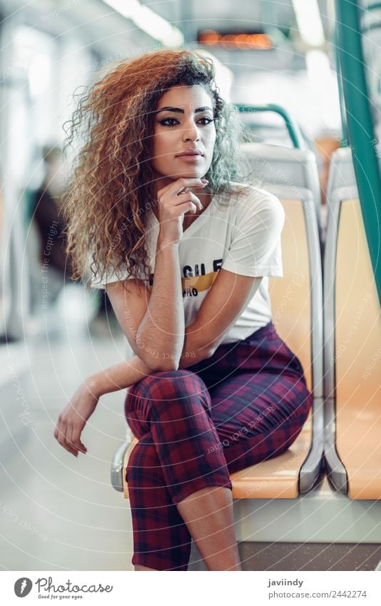 Arabic woman sitting inside subway train. Lifestyle Beautiful Hair and hairstyles Vacation & Travel Tourism Trip Human being Feminine Young woman