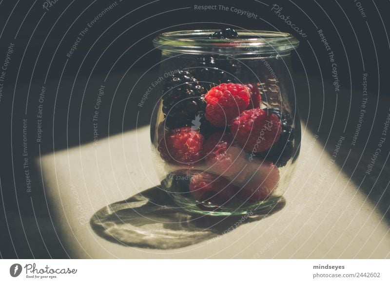 Forest berries in glass in sunlight Fruit Nutrition Glass Kitchen Blackberry Raspberry Preserving jar Eating To enjoy Growth Glittering Delicious Red