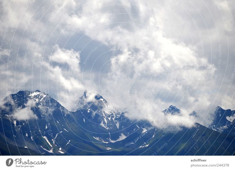 whipping cream Landscape Clouds Storm clouds Summer Weather Bad weather Rain Thunder and lightning Rock Alps Mountain Peak Snowcapped peak Glacier Esthetic