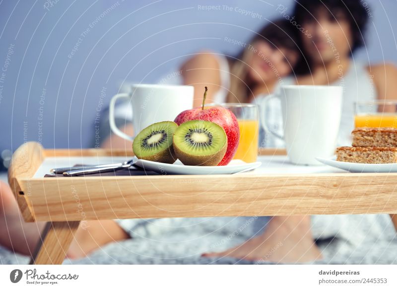 Pieces of fruit in healthy breakfast served on tray Fruit Apple Breakfast Juice Coffee Plate Lifestyle Happy Beautiful Relaxation Leisure and hobbies Bedroom