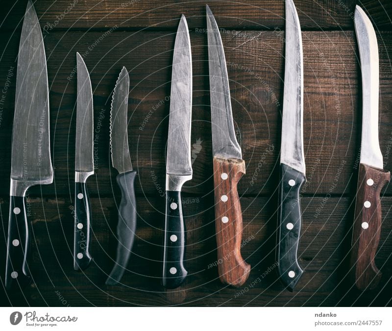 used different kitchen knives Knives Table Kitchen Wood Metal Steel Old Brown knife background blade board cooking cutting Domestic equipment food handle