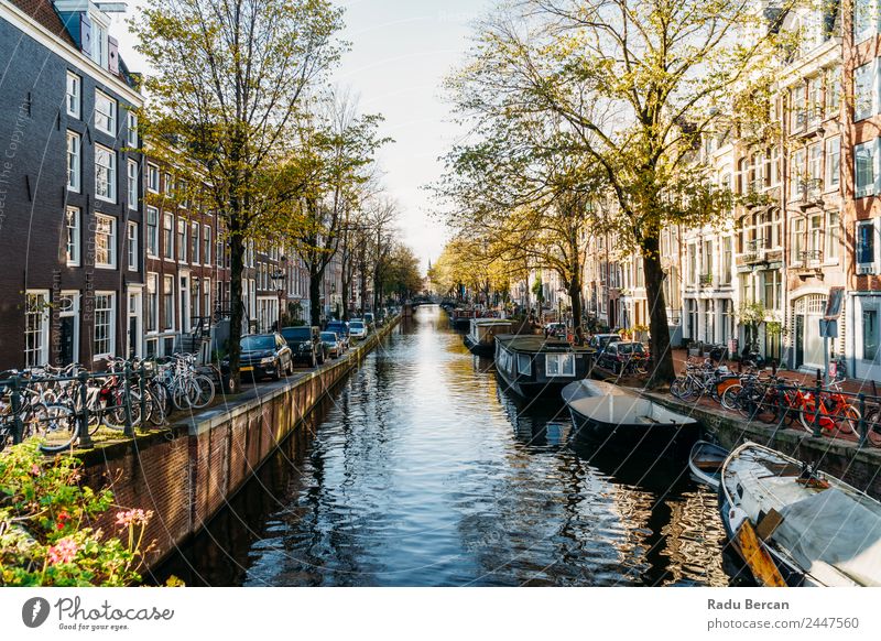 Dutch Houses and Houseboats On Amsterdam Canal In Autumn Lifestyle Elegant Style Design Vacation & Travel Tourism Trip Adventure Sightseeing City trip