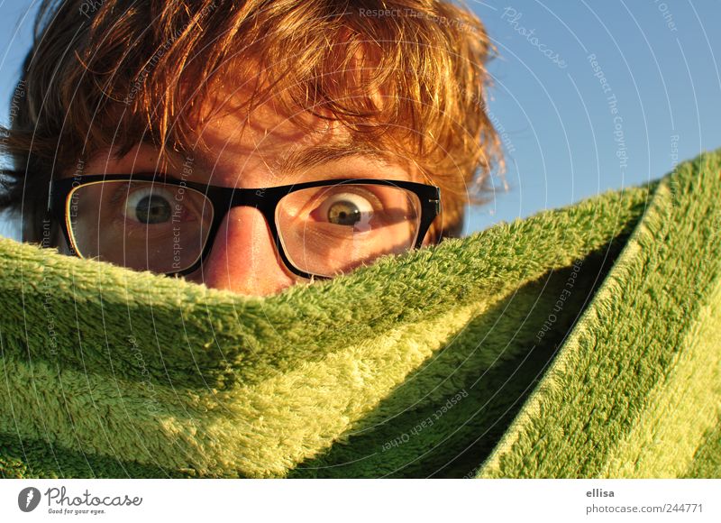 covert investigations Masculine Young man Youth (Young adults) Eyes Eyeglasses Observe Looking Blonde Blue Green Curiosity Spy Towel Stripe Surprise Concealed