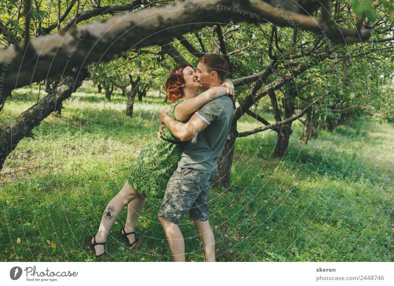 young couple in love walking in a summer Park Human being Masculine Feminine Young woman Youth (Young adults) Young man Family & Relations Couple Adults 2