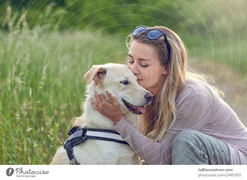 Happy smiling dog with its pretty young owner Lifestyle Joy Beautiful Leisure and hobbies Playing Summer Woman Adults Friendship 1 Human being 18 - 30 years