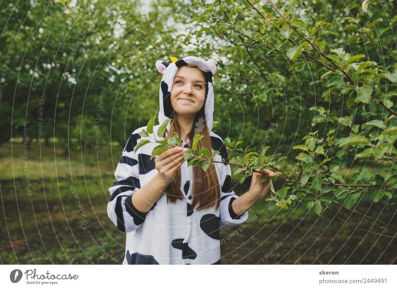 girl animator in cow pajamas near the tree Elegant Leisure and hobbies Playing Vacation & Travel Tourism Trip Adventure Party Event Feasts & Celebrations