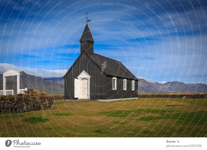 Black church in Budir, Icelandic wooden church with cemetery. Relaxation Calm Vacation & Travel Tourism Adventure Freedom Expedition Camping Summer Ocean