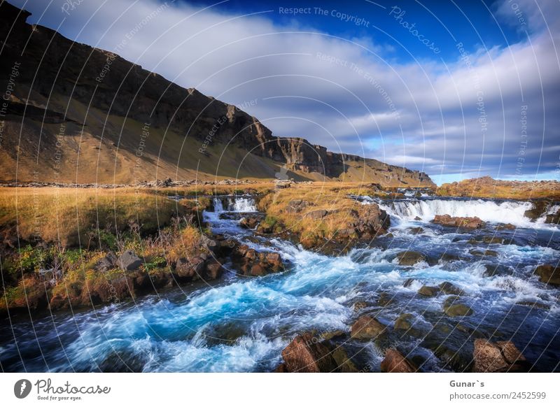 Turquoise coloured glacier river in Iceland with waterfall. Relaxation Calm Vacation & Travel Tourism Adventure Freedom Camping Summer vacation Mountain Hiking