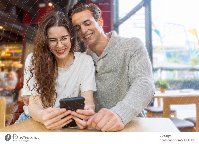 Funny couple or marriage sharing a smart phone Lifestyle Shopping Joy Happy Playing Flat (apartment) House (Residential Structure) Valentine's Day Wedding
