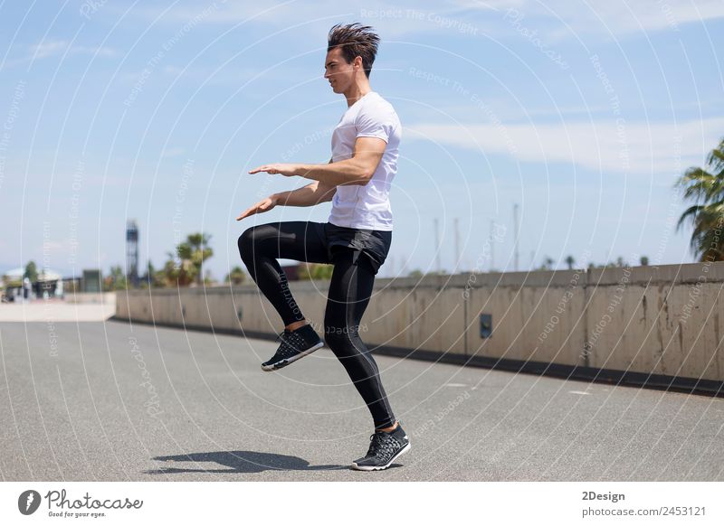 Happy man and jumping outdoors, warmup before jogging Lifestyle Wellness Sports Jogging Work and employment Human being Masculine Young man Youth (Young adults)