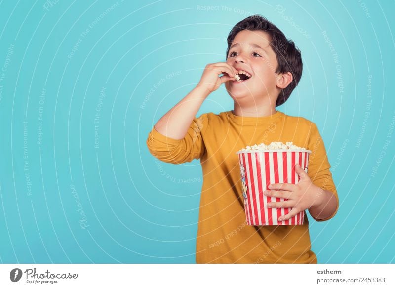 happy boy with popcorn Food Lifestyle Joy Leisure and hobbies Human being Masculine Child Toddler Boy (child) Infancy 1 8 - 13 years Theatre Cinema