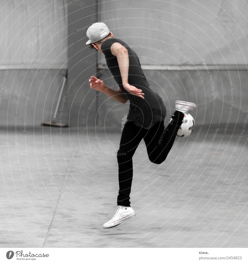 Hack trick Sports Sportsperson Foot ball Masculine Man Adults 1 Human being Hall Wall (barrier) Wall (building) T-shirt Pants Sneakers Cap Broom Sports Training
