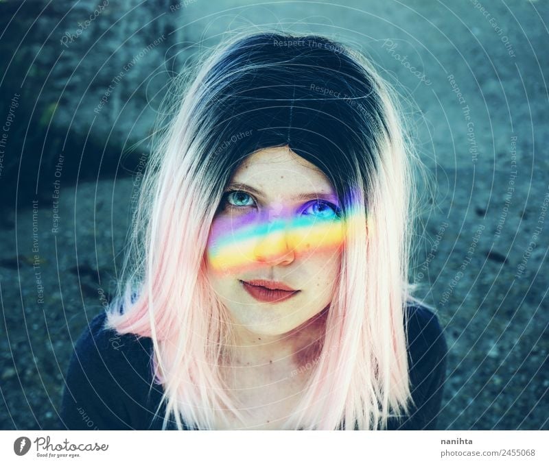 Artistic portrait of a young woman with a rainbow in her face Lifestyle Style Design Beautiful Hair and hairstyles Skin Face Human being Feminine Young woman