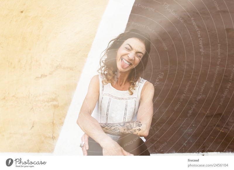 woman sticking out her tongue Lifestyle Happy Beautiful Face Relaxation Calm Human being Feminine Woman Adults Art Facade Street Tattoo Piercing Curl Graffiti