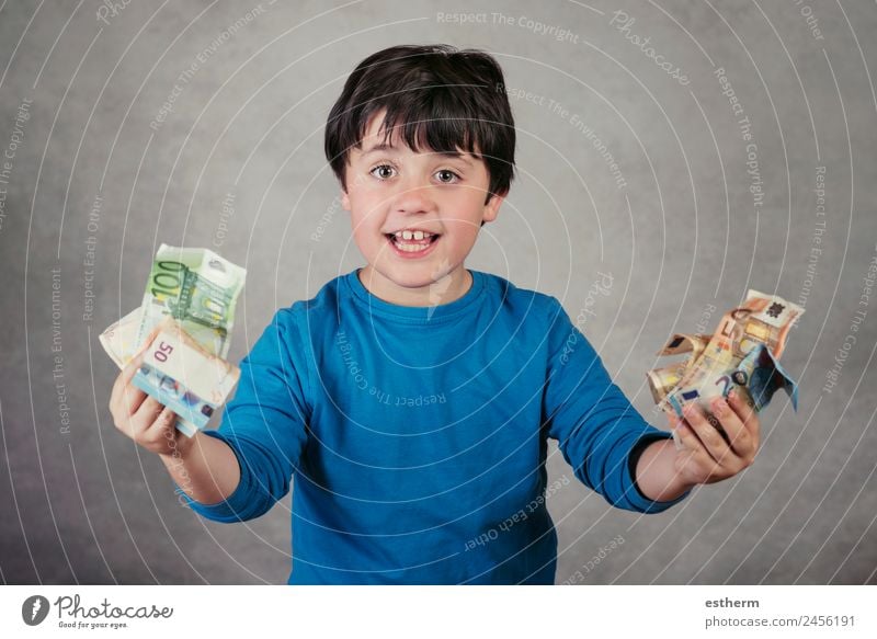 smiling boy with euro bills on gray background Lifestyle Shopping Joy Happy Money Child Work and employment Economy Financial Industry Financial institution