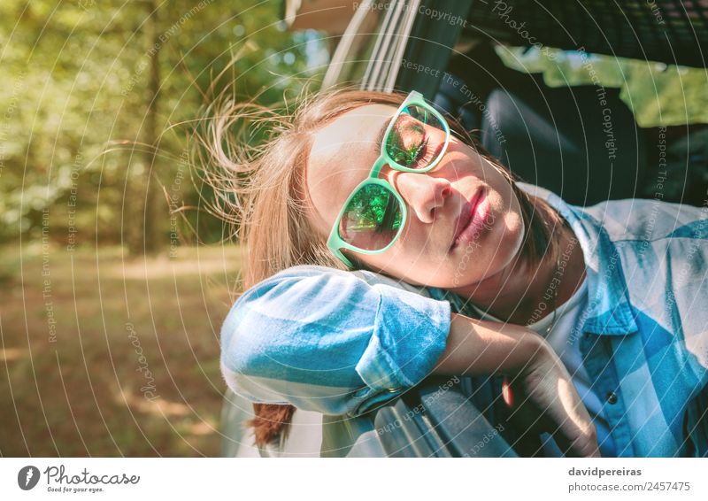 Young woman with her head over the door car Lifestyle Beautiful Face Relaxation Leisure and hobbies Vacation & Travel Trip Summer Human being Woman Adults
