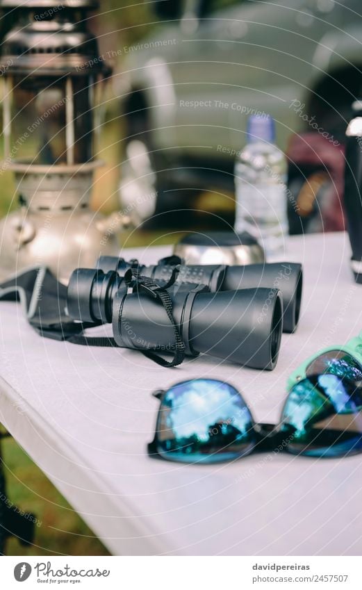 Close up of binoculars over camping table Lifestyle Joy Relaxation Leisure and hobbies Vacation & Travel Tourism Trip Adventure Camping Summer Mountain Table