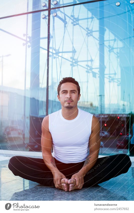 Latin man practicing yoga Lifestyle Sports Fitness Sports Training Yoga Warming up Human being Man Adults 1 18 - 30 years Youth (Young adults) Athletic Success