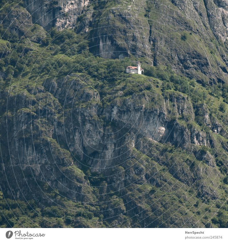 The only thing that helps is praying Landscape Rock Alps Mountain Church Exceptional Gray Green Unwavering Hope Belief Fear of the future Loneliness Threat