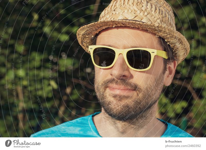 Man with sunglasses and hat Joy Contentment Relaxation Adults Face 30 - 45 years Garden Park Sunglasses Hat Natural Happiness Joie de vivre (Vitality) To enjoy