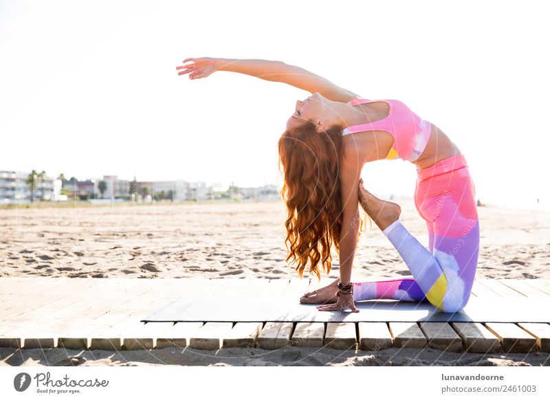 Woman practicing yoga on the beach Lifestyle Sports Fitness Sports Training Yoga Human being Feminine Adults 1 18 - 30 years Youth (Young adults) Clothing