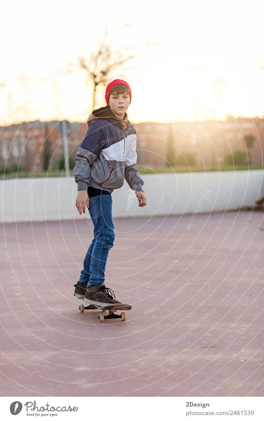 teenager practicing with skateboard at sunrise city Lifestyle Joy Relaxation Leisure and hobbies Summer Sports Child Human being Masculine Boy (child) Man