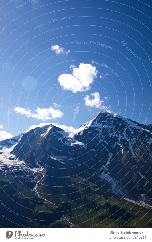 smoke sign Environment Nature Landscape Sky Clouds Sunlight Summer Beautiful weather Snow Tree Grass Bushes Forest Rock Alps Mountain Großglockner Massif