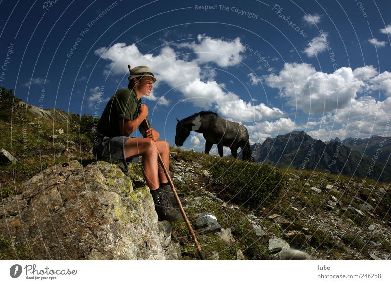 shepherd boy Happy Contentment Mountain Agriculture Forestry Masculine Young man Youth (Young adults) 1 Human being Nature Landscape Clouds Horizon Summer Rock