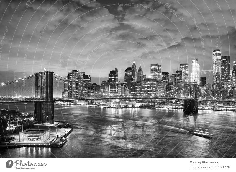 Black and white picture of New York cityscape at night. Office Sky River Town Port City Downtown Skyline High-rise Bank building Building Architecture Landmark