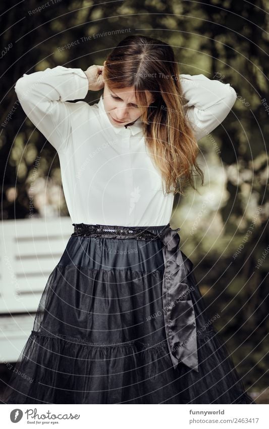 Woman with skirt and blouse grabs her hair Style Beautiful Feasts & Celebrations Human being Feminine Adults 1 30 - 45 years Fashion Clothing Skirt Blouse