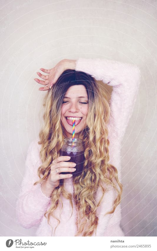 Happy blonde woman drinking a smoothie Fruit Vegetarian diet Beverage Drinking Cold drink Juice Milk Milkshake Lifestyle Style Design Joy Hair and hairstyles